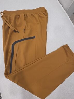 Under Armour Men's Mustard Joggers with Dark Reflective Accent